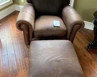 1. Natuzzi Leather Chair and Ottoman $950                              36" x 40" x 33" tall 