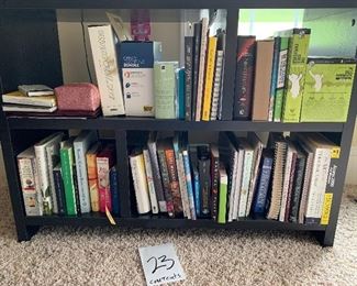 23. Books and contents of shelves shown $20