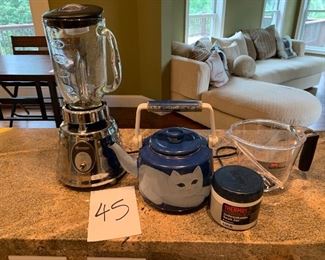 45. Osterizer blender, kettle and measuring cup $30
