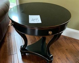 48. Black round table with drawer $90