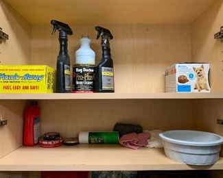 63. 2 cabinets and shelf of cleaning items $40