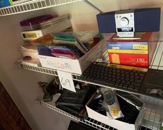 69. Left side of office supply closet with awards, and more $25