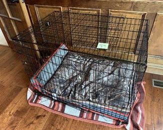 87. Large Dog Crate $55