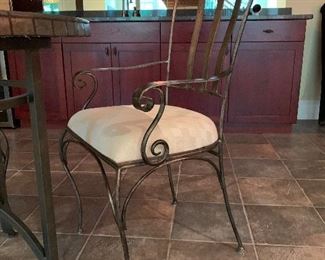 107 2 chairs and a solid tile table $150                                       36" diameter x 31" tall - chairs 24" x 21" x 38" tall 