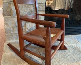 110. Childs Rocker with rope seat $30