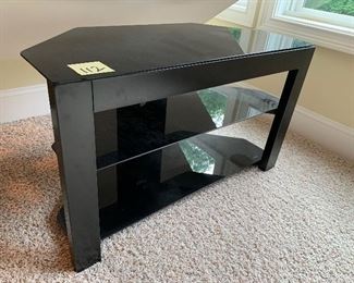 112. TV Stand glass and metal $40