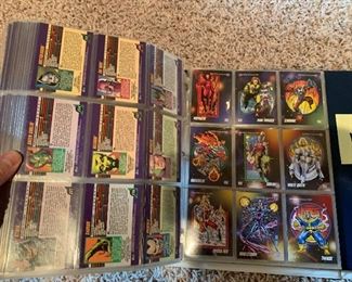 117. Marvel Superhero cards from the 1990s 2 binders probably 150 cards $35