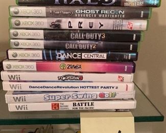 141. Xbox game lot 2 wtih Call of Duty, Halo and Wii games and more $40