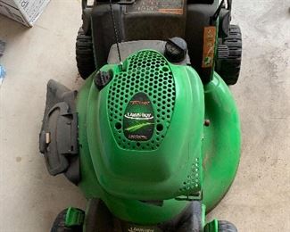 207. Lawn Boy self propelled Lawnmower.  Started for a minute, but gas was leaking out the filter area on side by pump.  did not continue to run.  $50 as is