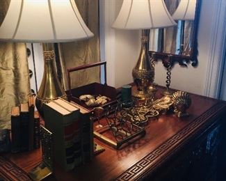 beautiful brass lamps, many antique mirrors, and fine old brass desk sets