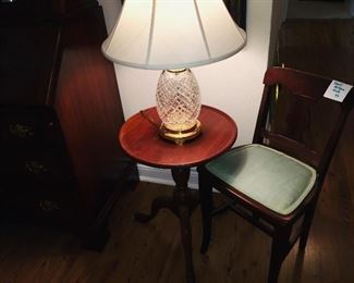 Small  table featuring one of several Waterford lamps 