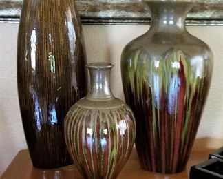 Beautiful ceramic vases for sale.                                                 Tallest Vase on left - 25.50                                                           Shorter Vase in center - 22.50                                              Vase on right - $34.50