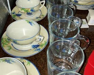 The glass mugs have bluebonnets.