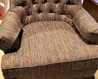 A comfortable tufted back chair