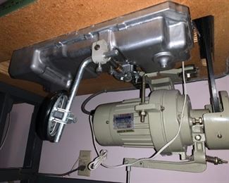 Underside of the JUKI Sewing Machine - Automatic-lubricating full-rotary hook