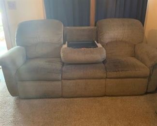 Lazy Boy 84 inch reclining couch with flip down tray.