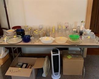 Glasses.  China.  Disney glasses.  Plates.  Bowls.  Bakeware.   Lasko space heater, Variety of DVDs.  Collectable model cars.