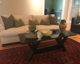 Custom Carrera Marble coffee table.
Exquisite piece of caramel and black marble on custom black wooden base.  150 pounds