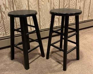 Black wooden stools 