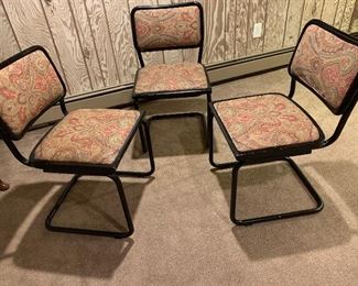 Vintage sliding chairs     Breuer chairs