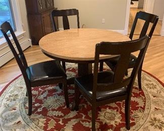 42" round table w/4 chairs  Ashley's Furniture