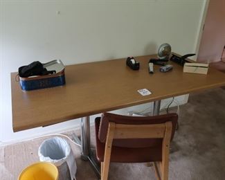 writing  desk ,  chair-table  is  2'7" deep  and 5'1" across