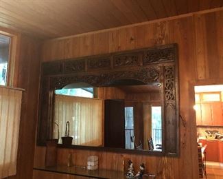 Mirror  framed by an entry gate to a garden in Thailand 
89" L  x  55 1/2" H.   $2000.00