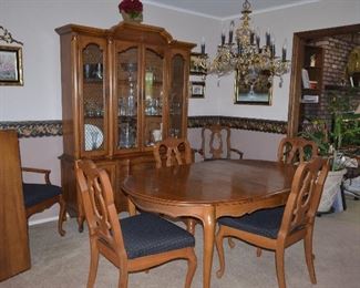 8 pc set French Provincial Dining Table(2 leafs)  and 6 chairs with China Cabinet.                Table 66"W x 42"D x 29"H                                                           China Cabinet 62"W x 18"D x 27 1/2 + 53"H