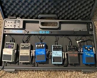 Boss Pedal Board BCB-60  /left to right / Boss Chromatic Tuner TU-2 /  Boss Equalizer GE-7 / Boss Compression Sustainer CS-3 /  Boss Chorus Ensemble CE-5 / Boss Metal Zone MT-2 / Boss Blues Driver BD-2  