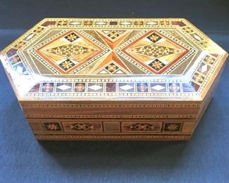 An intricately crafted inlaid wood and bone middle eastern hexagonal box