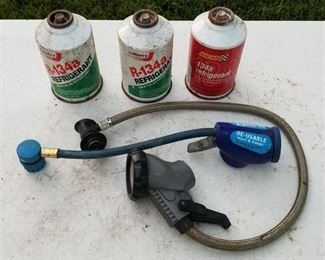 3 cans of R-134a refrigerant and two gauges