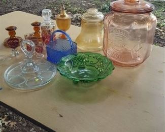 assorted glassware. peanut jar, glass basket, decanter set and more