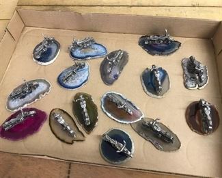 15 motorcycles on geode slabs, very small figurines