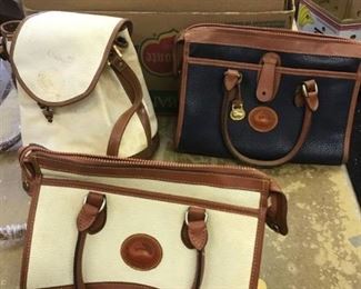 3 Dooney and Bourke leather bags. 2 shoulder rises, 1 crossbody (dirty and missing label)