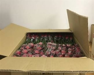 lot of red artificial floral bouquets