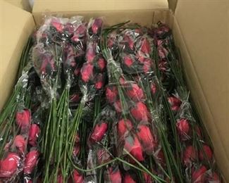 lot of red artificial floral bouquets