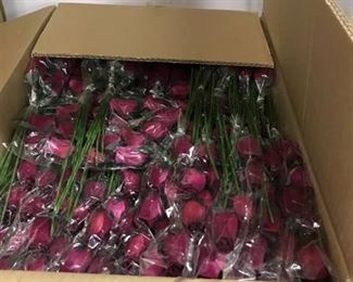 box of maroon artificial floral bouquets