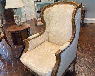High back upholstered arm chair