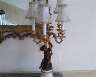 Fine pair patinated bronze Putti lamps with ormolu mounts on marble bases