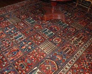 one of several antique rugs