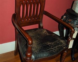Carved chair with leather seat
