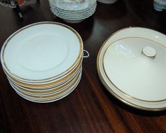 Dinner plates and covered serving bowl