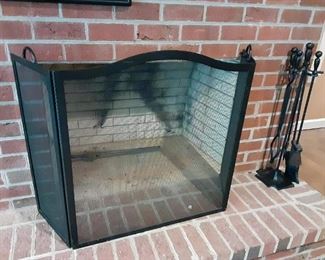 Black metal fireplace screen and fireplace tool set