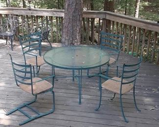 Green patio set.  Four chairs and table