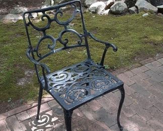 Set of five black iron chairs- detail