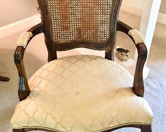 Side chair with a caned back and an upholstered seat. Excellent condition.