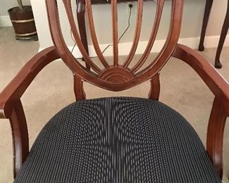Dining room chair with a caned back and upholstered seat. Excellent condition.