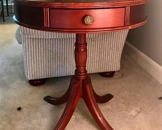 Vintage Mahogany Top Drum side table, claw feet, and brass drawer knob.