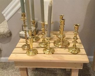 SMALL WOOD SLAT TABLE                                                                       BRASS CANDLESTICK HOLDERS