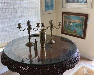 Anglo-Indian Carved Round Tilt Top Table with Eagle and Dragon Motif 29" high by 52" wide. Circa mid-twentieth Century with glass top